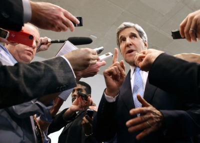 U.S. Secretary of State John Kerry speaks with reporters at the U.S. Capitol before testifying to the Senate Banking and Urban Affairs Committee in Washington, DC on Nov. 13, 2013. (Chip Somodevilla/Getty Images) 