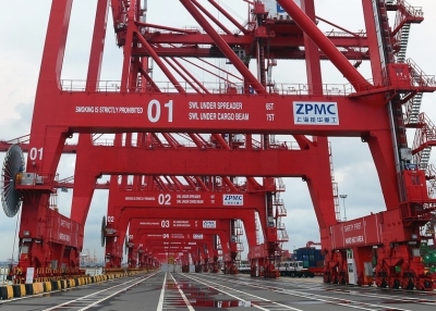 This photo taken on September 10, 2014 shows gantry cranes lined up at the new Chinese-majority owned Colombo International Container Terminal (CICT) in Colombo. China's president kicked off his first South Asia tour with a visit to Beijing's latest investment in Sri Lanka, a US$1.4 billion port city development to include a marina and a Formula One track, all just 250 kilometres (150 miles) from India's coast.